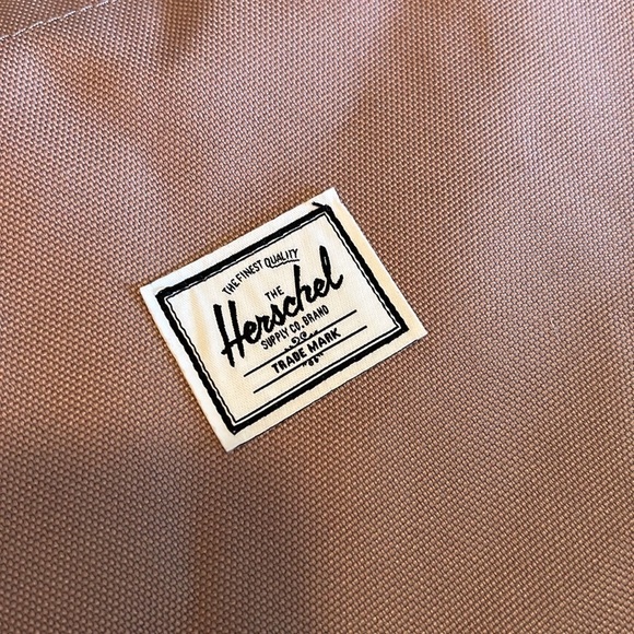 Herschel Supply co. Large bag on pale pink.
